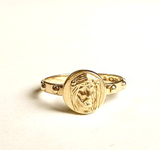 Anello religioso volto di